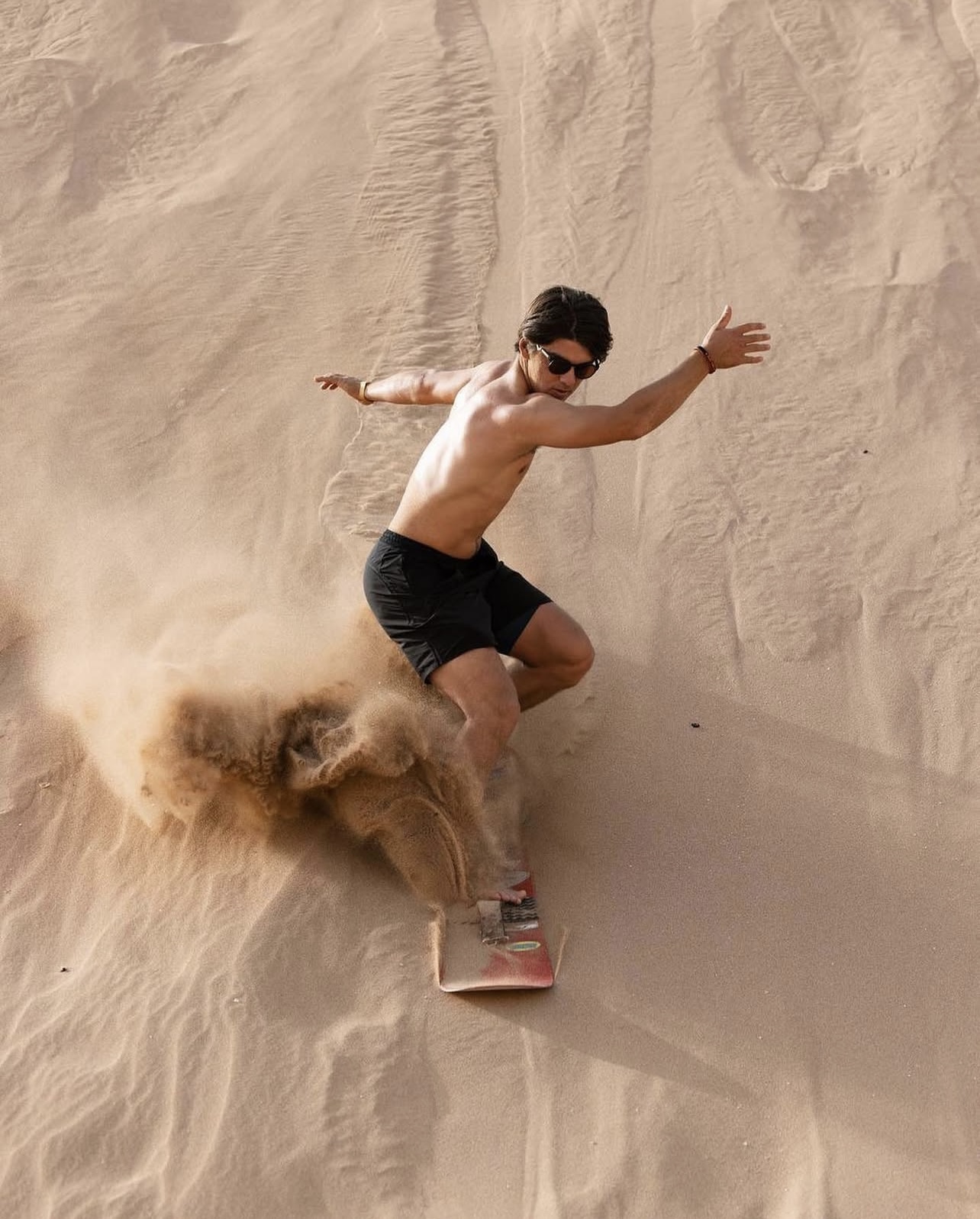Sandboarding action on the dunes