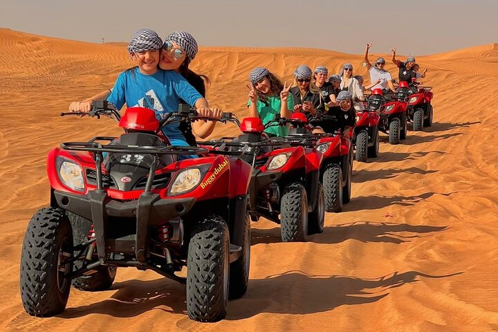 Quad biking on red dunes