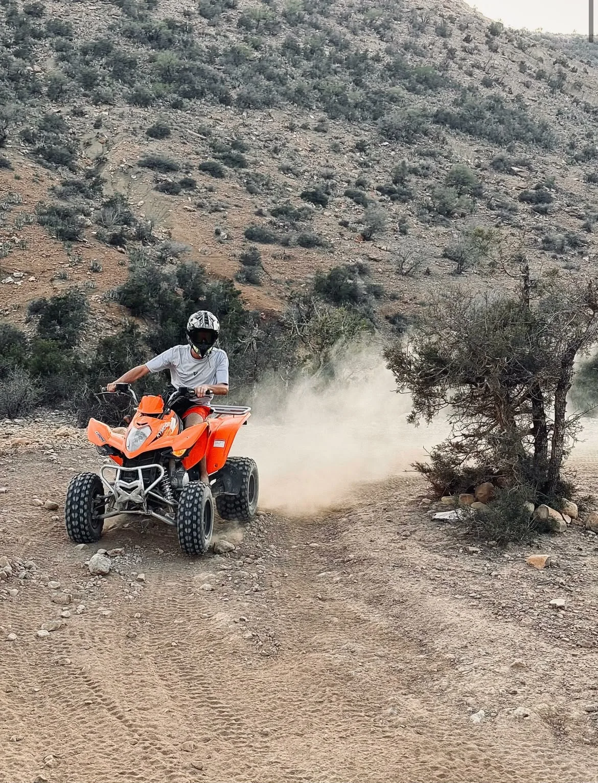 Two quad bike riders on a mountain trail near Agadir